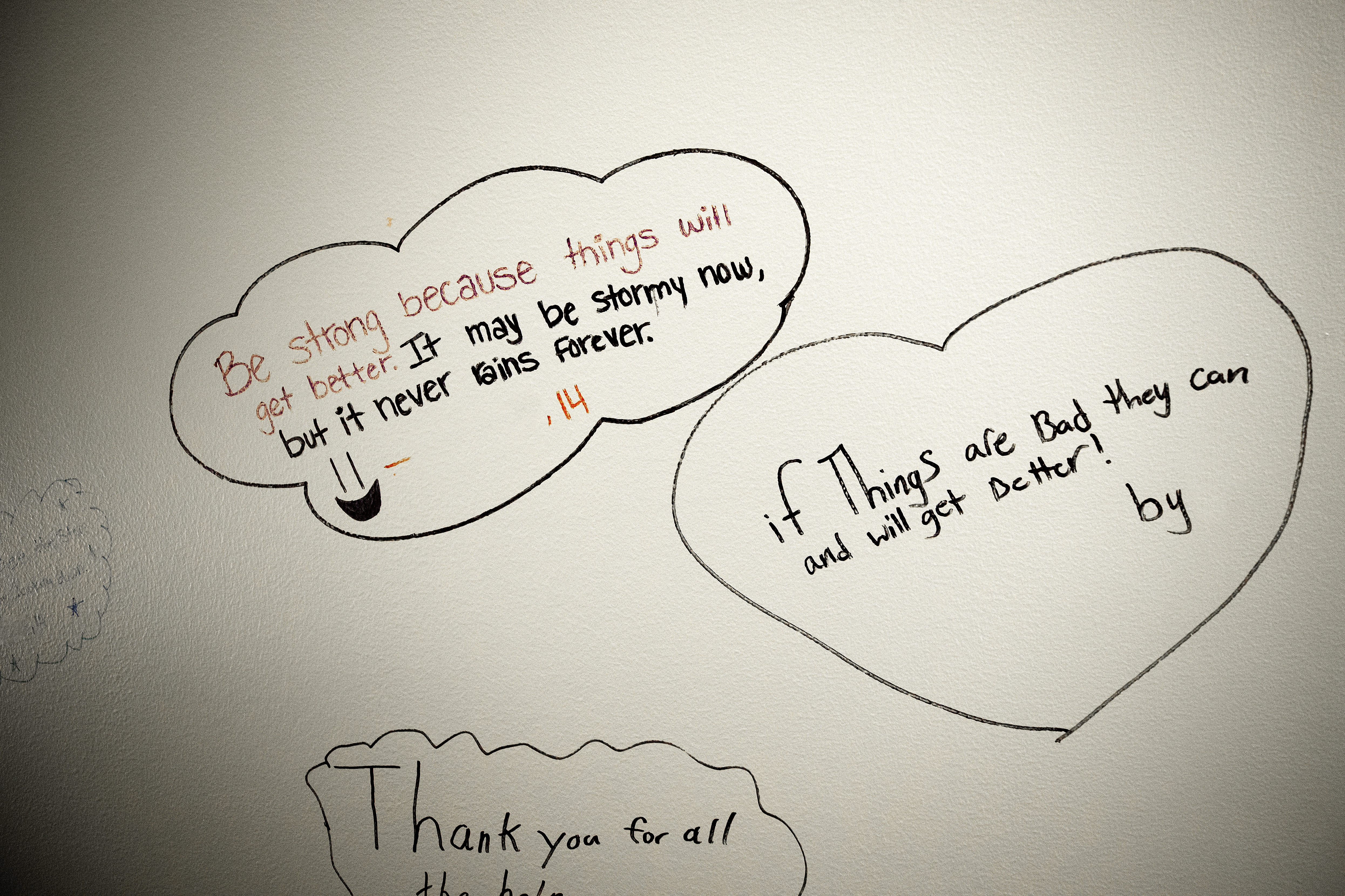 Messages written by abuse victims in the stairwell of Lincoln's Child Advocacy Center.