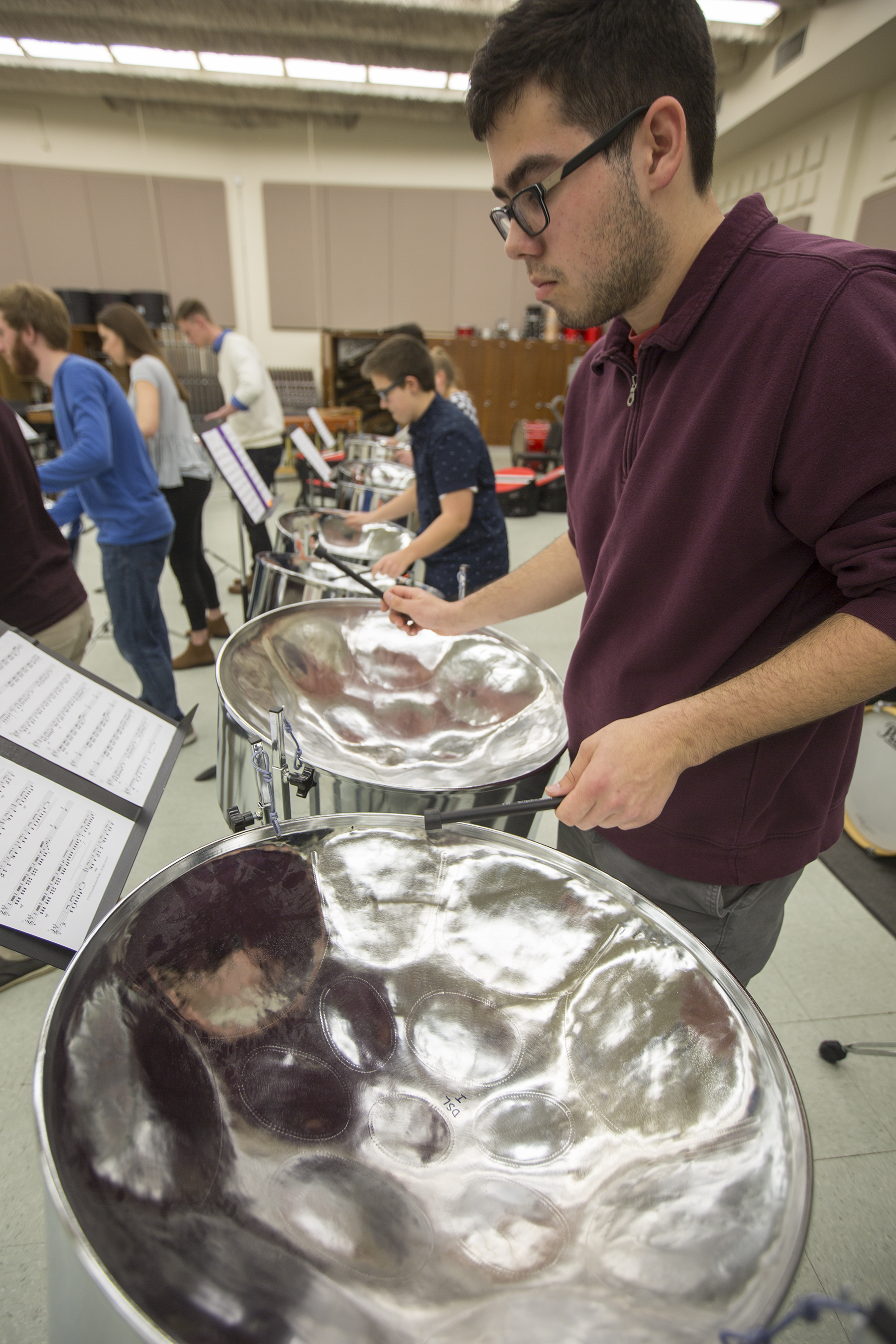 Colton Reddoch, a freshman music education major, plays a double second during Nebraska Steel practice in Westbrook Music Building.