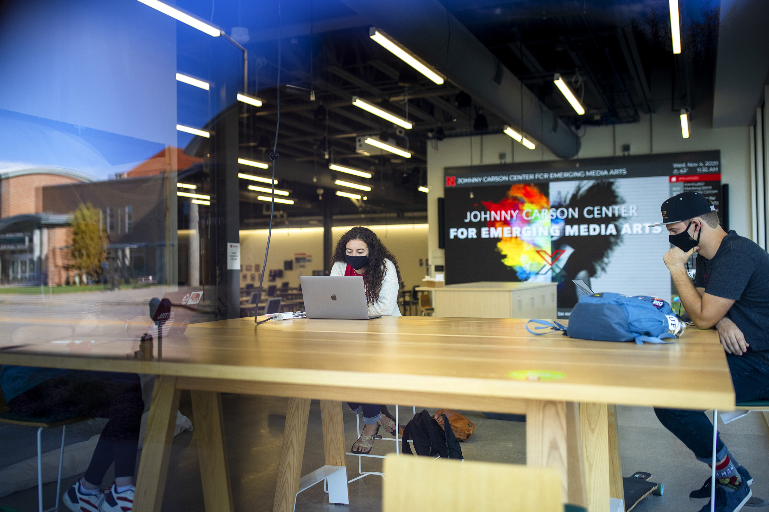 Students study inside the Johnny Carson Center for Emerging Media in November 2020. Forty-two students have been selected to join the third and largest Carson Center cohort.