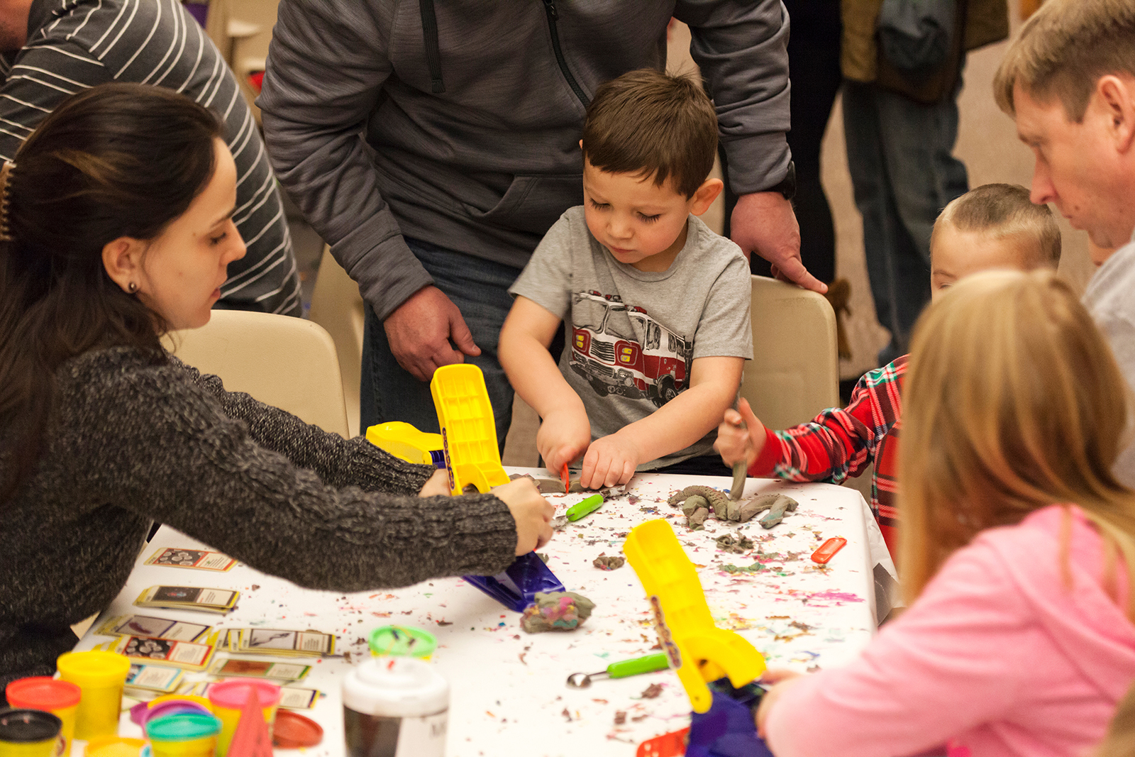 Children work with modeling clay during a previous Dinosaurs and Disasters event at Morrill Hall. The 2023 event is 9 a.m. to 5 p.m. Feb. 4.