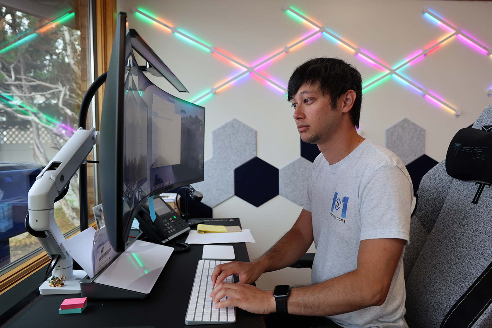 Cody Lawson works on his computer at 1to1 Technologies in Central City, Nebraska.