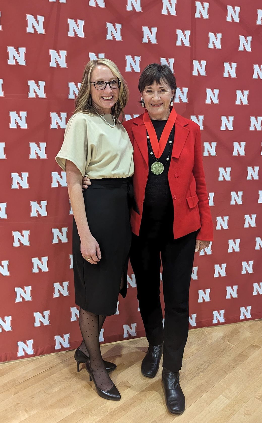 Shari Veil (left), dean of the College of Journalism and Mass Communications, is seen with humanitarian and 1964 graduate Jane Olson.