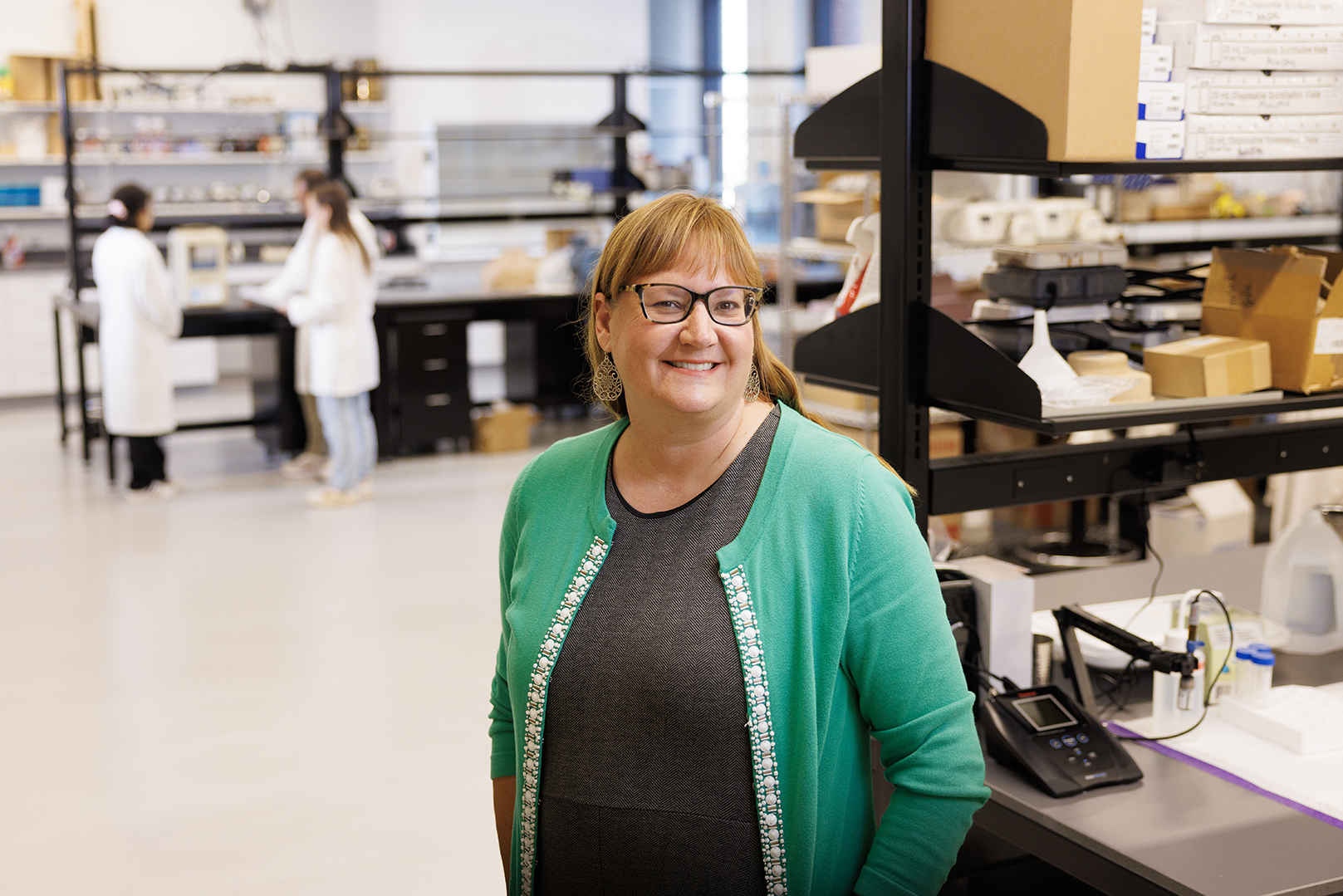 Shannon Bartelt-Hunt, the Donald R. Voelte Jr. and Nancy A. Keegan Chair of Civil Engineering, stands in a lab.