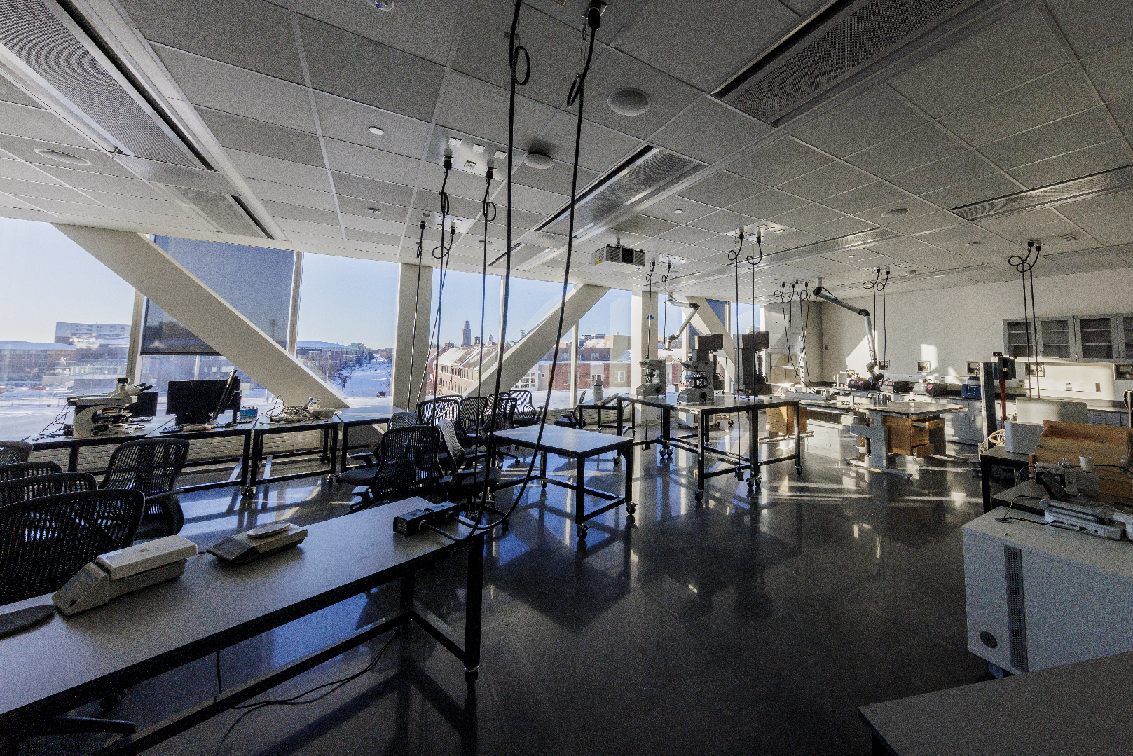 A robotics lab in Kiewit Hall featuring carts with roller wheels.