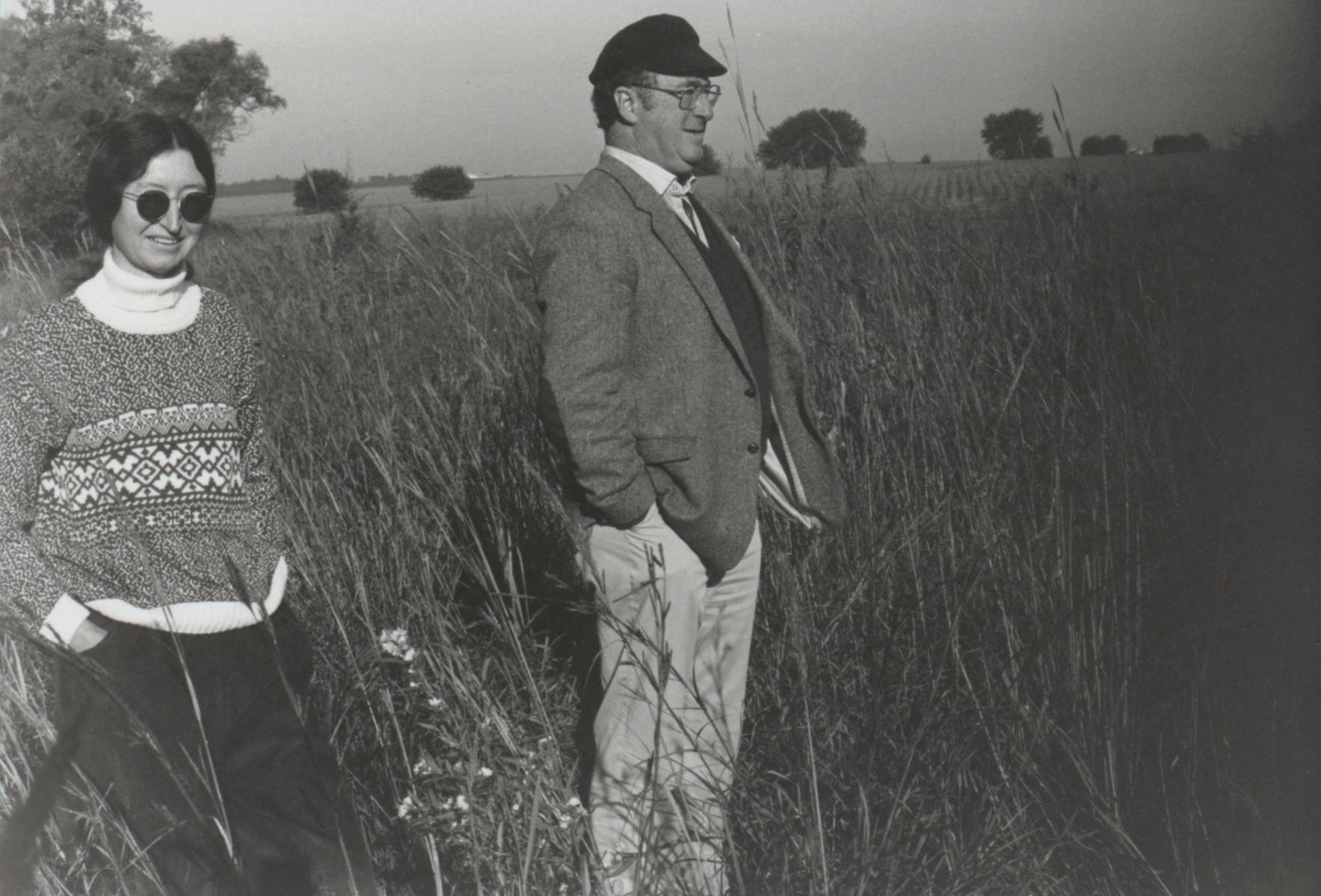 Fran Kaye, professor of English, stands next to Jim McCrorie, then director of the Great Plains Research Centre at the University of Regina, in a tallgrass prairie.