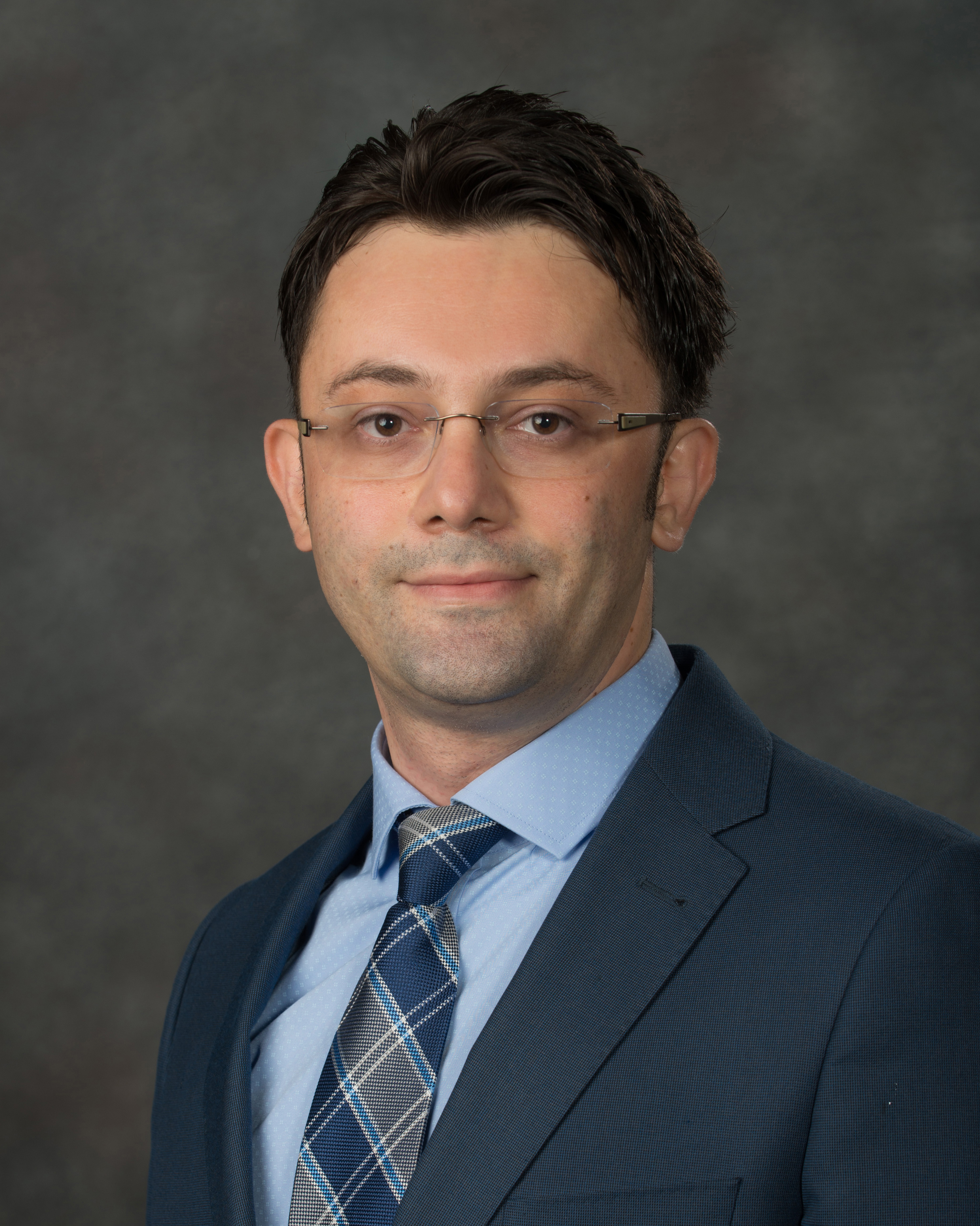 Color portrait of Erkut Sönmez, associate professor of supply chain management and analytics at the University of Nebraska–Lincoln.