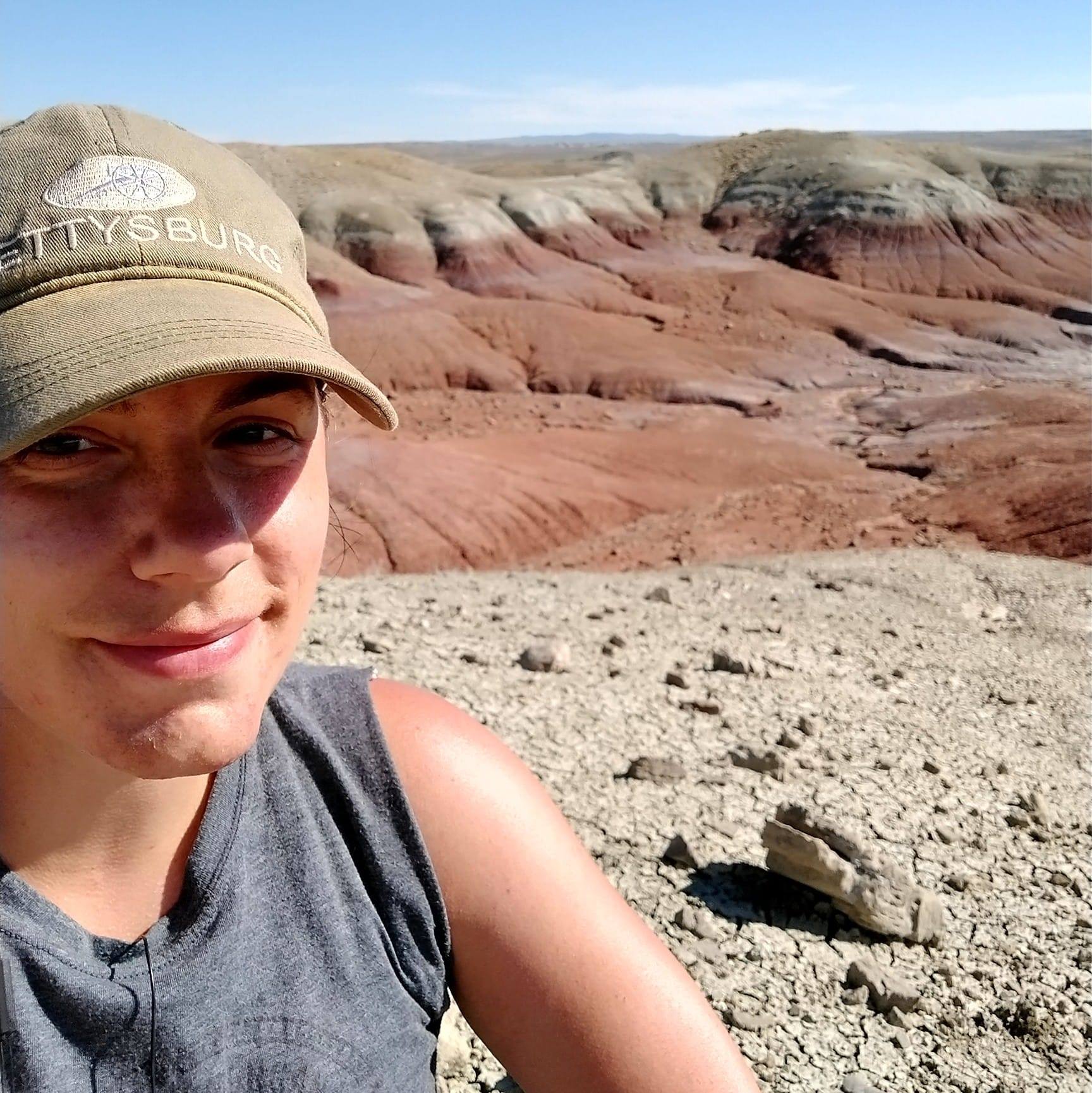 Alex Shupinski is shown in Bighorn Basin in Wyoming, where she collected Cenozoic era fossils.