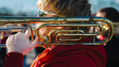 A trombone player practices during the Cornhusker Marching Band's trip to the Music City Bowl in December. Walker Pickering, a photography professor, has captured images of marching bands and drum corps since 2006.
