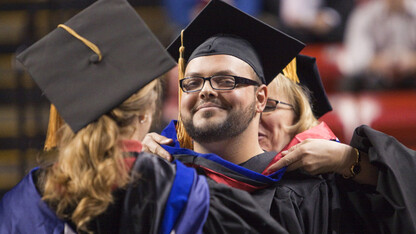 In this 2010 file photo, Andrew Bedrous receives his doctoral degree hood.