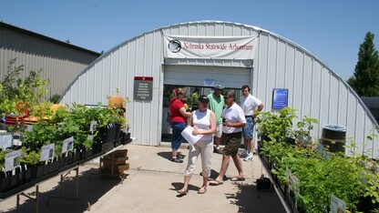 Shoppers seek plants at the Nebraska Statewide Arboretum sale on East Campus.