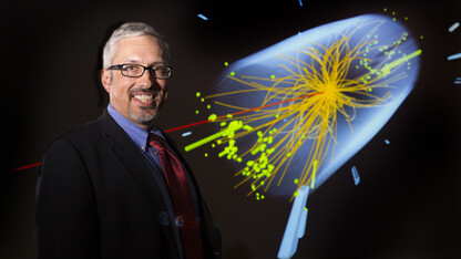 UNL physicist Aaron Dominguez leads collaboration involving eight universities to upgrade the Compact Muon Solenoid particle detector, a key component of the world’s largest physics experiment. The illustration shows an event, captured by CMS in 2012, that provides evidence of the Higgs boson.