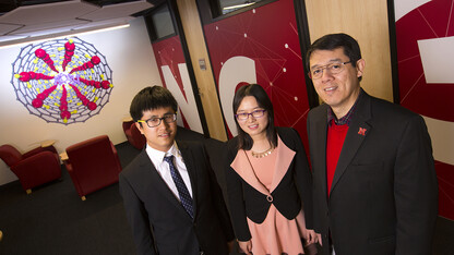 Researchers (from left) Chongqin Zhu, Yingying Huang and Xiao Cheng Zeng co-authored a study that has predicted the existence of a new form of ice.
