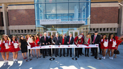 University administrators and project donors cut the ribbon during the March 28 dedication of UNL's Adele Coryell Hall Learning Commons. The 24-hour learning and study space opened for student use in January.