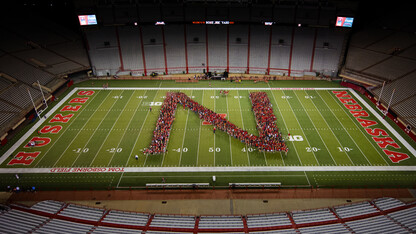 Members of the University of Nebraska–Lincoln's freshman class line up in the shape of an "N" during the New Student Tunnel Walk on Aug. 27. For the second year, enrollment at the university has surged to an all-time high.