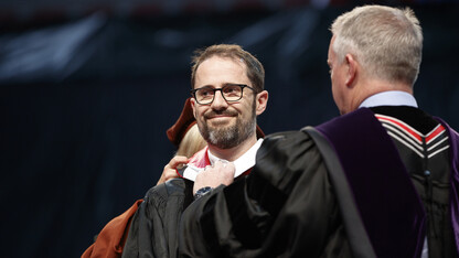 Evan Williams, Nebraska native and founder of Twitter, receives an honorary degree before he delivered the commencement address on May 6.