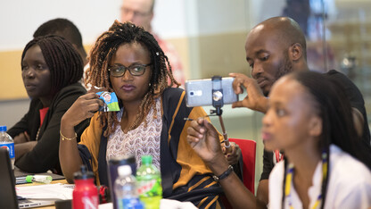 Obolibe from Togo films Fatou from Guinea sample a Ben and Jerry's ice cream slice while listening to Chris Tuggle, Assistant Professor of Marketing, talk about strategic management using the icre cream company as an example. Mandela Washington Fellowship for Young African Leaders.  The university is hosting 25 emerging leaders from 49 sub-Saharan African nations for a six-week Civic Leadership Institute. June 20, 2017.