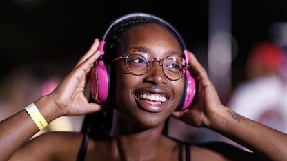 Kadina Koonce dances during the Headphone Disco performance outside the Nebraska Union on Aug. 25.