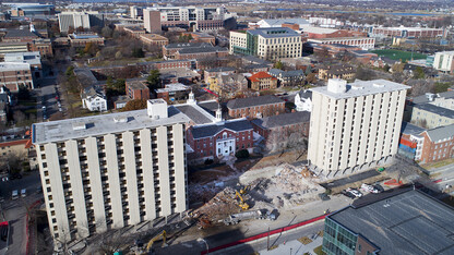 Prep work at Cather and Pound halls continues as the towers are being prepared for a Dec. 22 implosion.