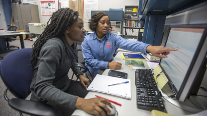 Nebraska's Terri Norton (right) works on a project with Lucy Ampaw Asiedu, a graduate student in architectural engineering.