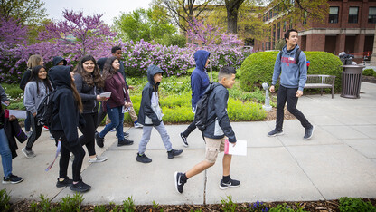 Michael Litton leads a group of Lexington middle schools students on a tour of campus in early May. Due to demand from the public, Nebraska Admissions has started to offer a variety of programs directed at middle school students interested in knowing more about college.