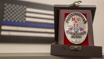 The University Police Department is celebrating the 150th anniversary of the university with a new badge that features the Love Library cupola and N150 logo. The badges, paid for by the Nebraska Fraternal Order of Police, feature two colors — silver for officers, gold for department leadership — and are being worn by commissioned officers.