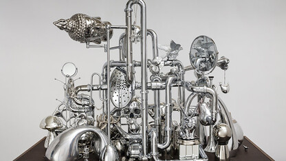 David Baskin, “Vanitas,” chrome, metal, plastic and wood, 48”x72”x32”, 2017.