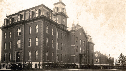 Military cadets line up outside University Hall, the first building on campus, in this undated photo. The history of the first buildings on campus is the focus of the Feb. 12 Nebraska Lecture.