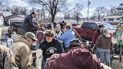 Nebraska Extension and community volunteers combine flood relief efforts in spring 2019, after floods ravaged much of the state. (Photo by Jason Wessendorf, Verdigre Eagle)