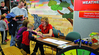 Milda Vaitkus, project manager in UNL's School of Natural Resources, runs the "Where's the Weather" booth during the 2014 Weatherfest. The 16th annual Weatherfest will take place from 9 a.m. to 2 p.m. and the Central Plains Severe Weather Symposium will run from 1 to 4 p.m. April 16 at Hardin Hall, 3310 Holdrege St. 