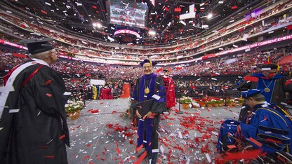 UNL Chancellor Harvey Perlman stands in a confetti shower at the end of the undergraduate commencement ceremony on May 6. The confetti was a special feature to celebrate his final day as chancellor.