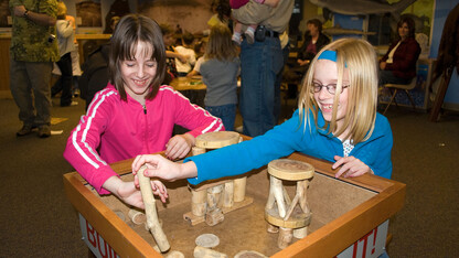 Young visitors explore science through hands-on activities in the Dr. Paul and Betty Marx Science Discovery Center in Morrill Hall. The museum will offer free admission from 4:30 to 8 p.m. each Thursday in July.