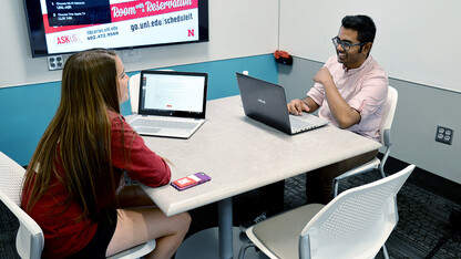 Student strengths coach Shivang Vaidya (right) leads a one-on-one coaching session.