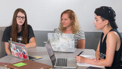 (From left) Rachel Gordon, Beverley Rilett and Megan Ekstrom discuss the George Eliot Archive during a meeting June 15 in the Adele Hall Learning Commons at Love Library. Not picture is team member Riley Jhi, who attended the meeting via Skype.