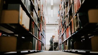 A student studies in the Love Library stacks in December 2018. More than 5,300 University of Nebraska–Lincoln students made the fall Deans' List/Explore Center List of Distinguished Students.