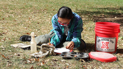 Phuong Minh Tu Le makes notes about her soil texture and soil color determinations during an Oct. 2 practice session in advance of the Region 5 Soil Judging Competition. The competition is being held virtually this year. Lana Koepke Johnson | Department o