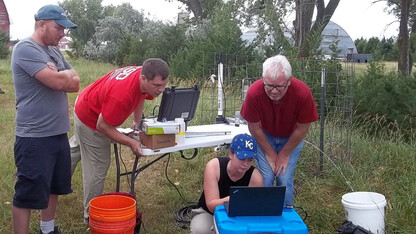 From left, Aaron Mittelstet, Troy Gilmore, Mikaela Cherry and Didier Gatsmana sample groundwater in the Little Blue Natural Resources District near Hastings in July 2018. A recent study from Cherry, doctoral candidate in the School of Natural Resources, and colleagues found that winter precipitation reloads most of the state’s groundwater supply.