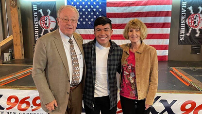 Mainor Ramirez Tercero (center) attended President Carter's tailgate celebration in fall 2022 with his mentors and benefactors Dr. Klaus and Gisela Hartmann.