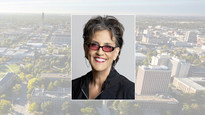 Color portrait of Martha Schwartz on campus background