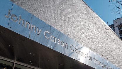 A metal sign reads "Johnny Carson Center for Emerging Media Arts."