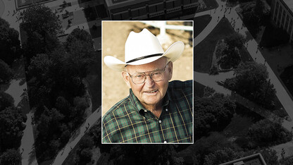 Color portrait of Paul Engler on a black campus background