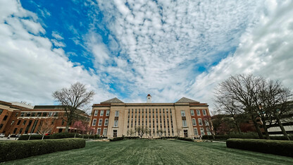 The south side of Love Library under a cloudy sky