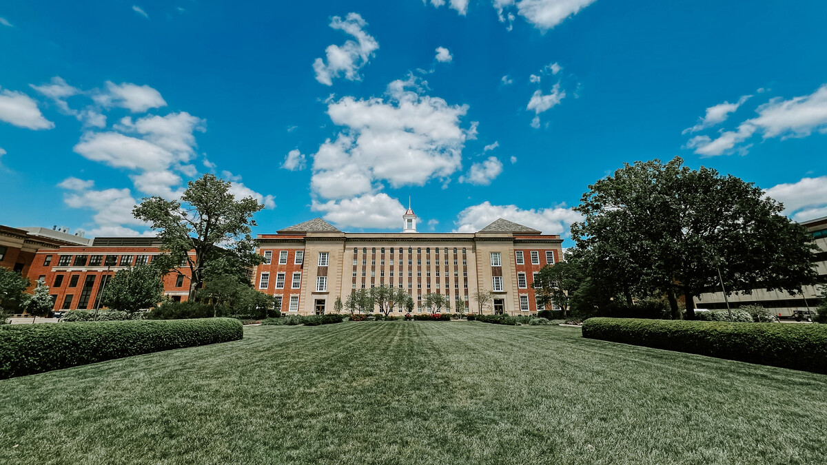 The Love Library South lawn on a partly cloudy day.