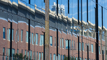 Jorgensen Hall is reflected in the ongoing construction of the College of Engineering’s first phase expansion. The project is replacing the “Link,” which connected Nebraska Hall to the Walter Scott Engineering Center.