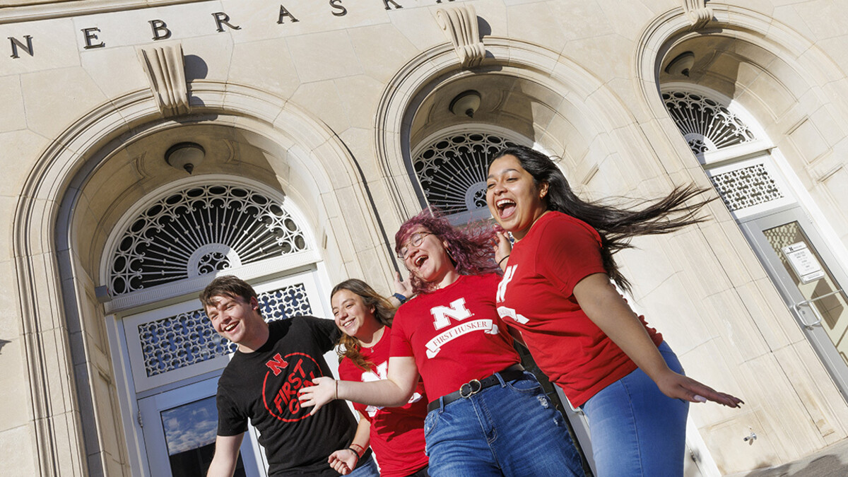 First-generation students celebrate on the steps to the Nebraska Union.