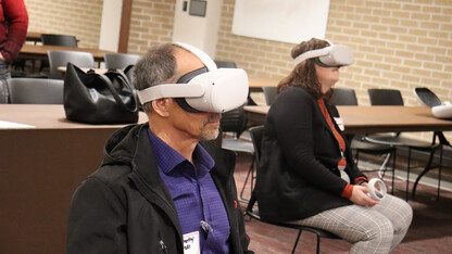 Many attendees, including Timothy Janda and Leah Widdowson, tried virtual reality and learned how it could be used in the classroom at the Fall 2022 Teaching and Learning Symposium. November 11, 2022. Photo by Molly Mayhew / CTT
