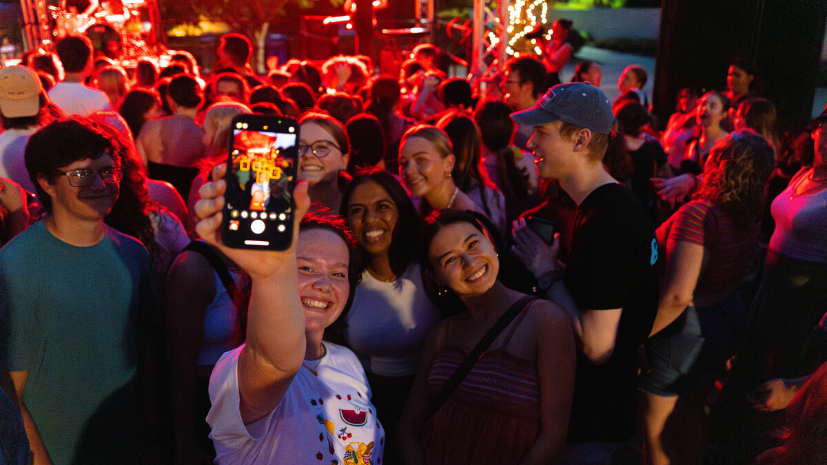 Students enjoy the free concert by Maude Latour.