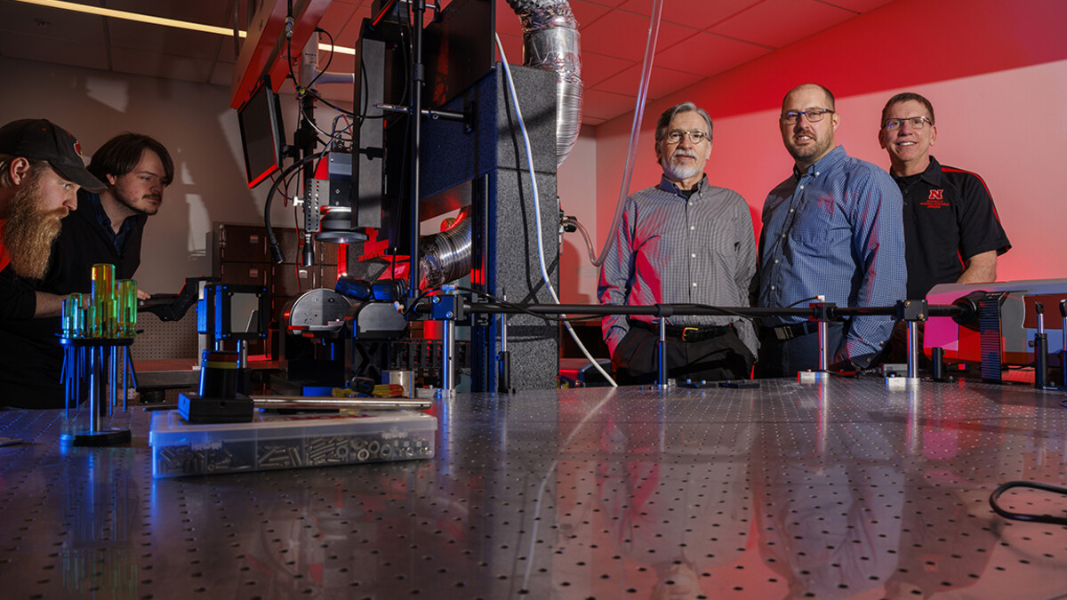 George Gogos, Craig Zuhlke and Jeffrey Shield are part of a $9.2 million grant awarded by the Department of Defense to a team headed by Northrop Grumman Corp. The goal of the research is to create smaller, scalable 3D stacks of chips and heat transfer technologies that will help regulate thermal management in those structures. At left are graduate students Josh Gerdes and Andrew Butler.