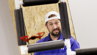 Concentration shows on Nick Restau’s face as he tries to pilot a small UAV through an obstacle course at Nebraska Innovation Studio. Restau, from Milford Public Schools, is one of several teachers training to get their drone license in a class taught by Travis Ray from NIS.