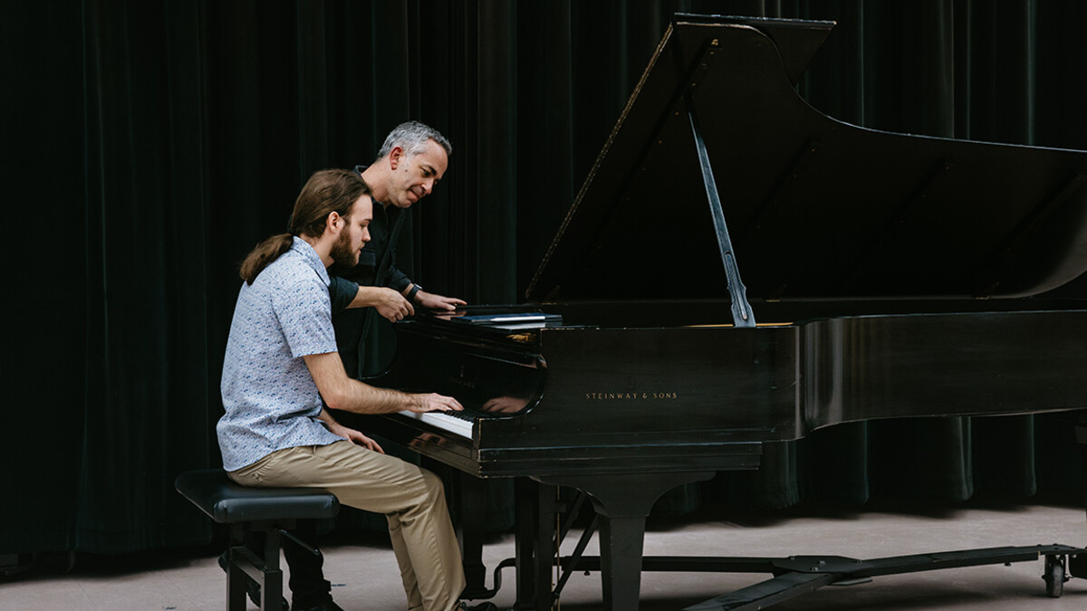 Nathaniel Brown, a senior Music major performs for Iron Barnatan, a classical pianist who is instructing a piano masterclass from the Academy of St. Martins in the Fields.
