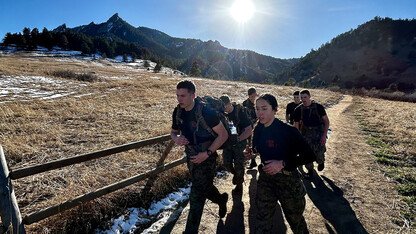 Members of the University of Nebraska–Lincoln's Naval ROTC endurance team race at the Colorado Drill Meet.